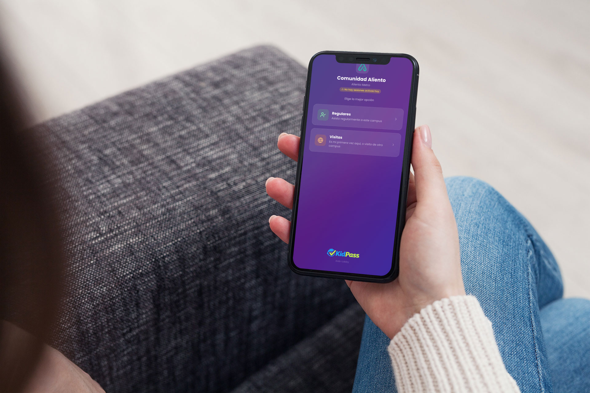 Pantalla de check-in KidPass en teléfono